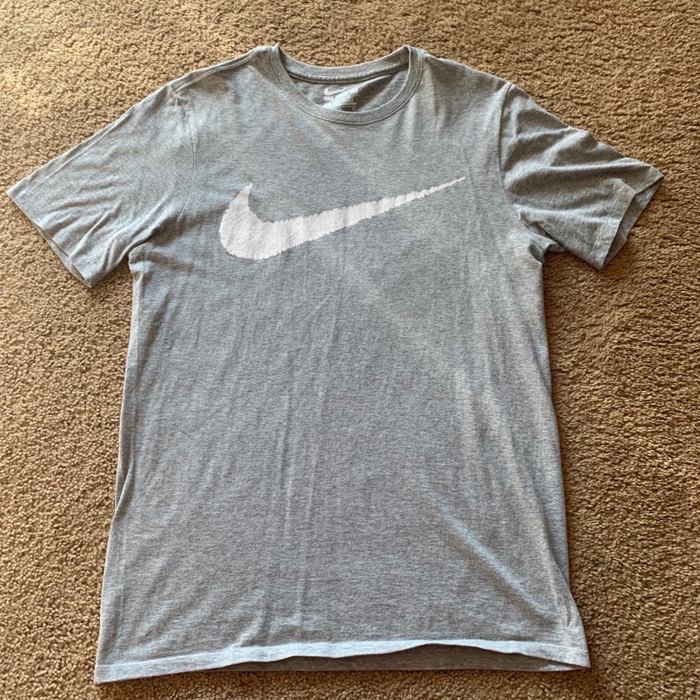 Nike “swoosh” shirt size medium
